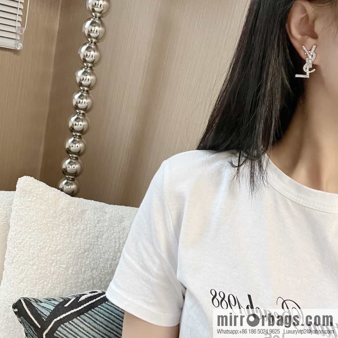 Saint Laurent silver YSL stud earrings