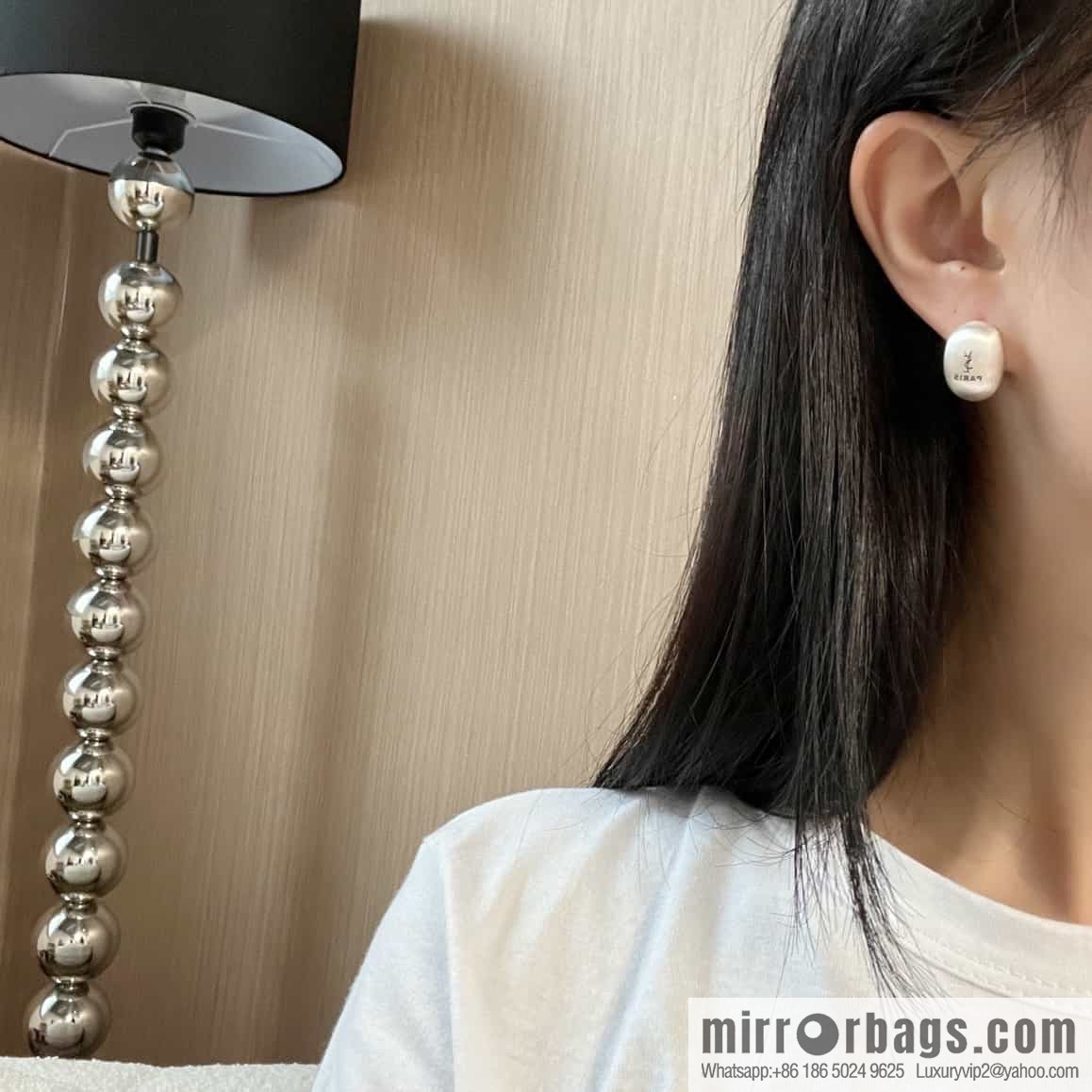 Saint Laurent silver YSL brushed oval stud earrings