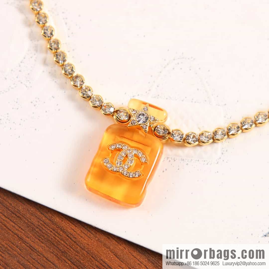 New ☑️ Chanel double c orange yellow perfume bottle necklace