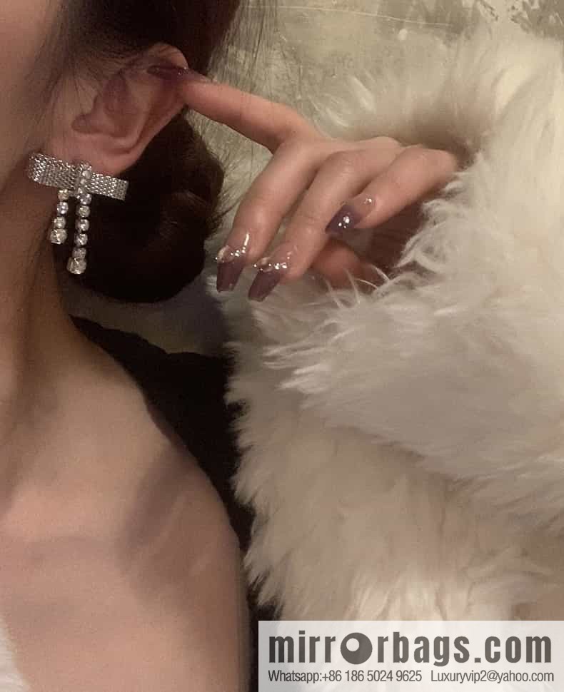 MIU MIU Miu Miu bow fringed stud earrings
