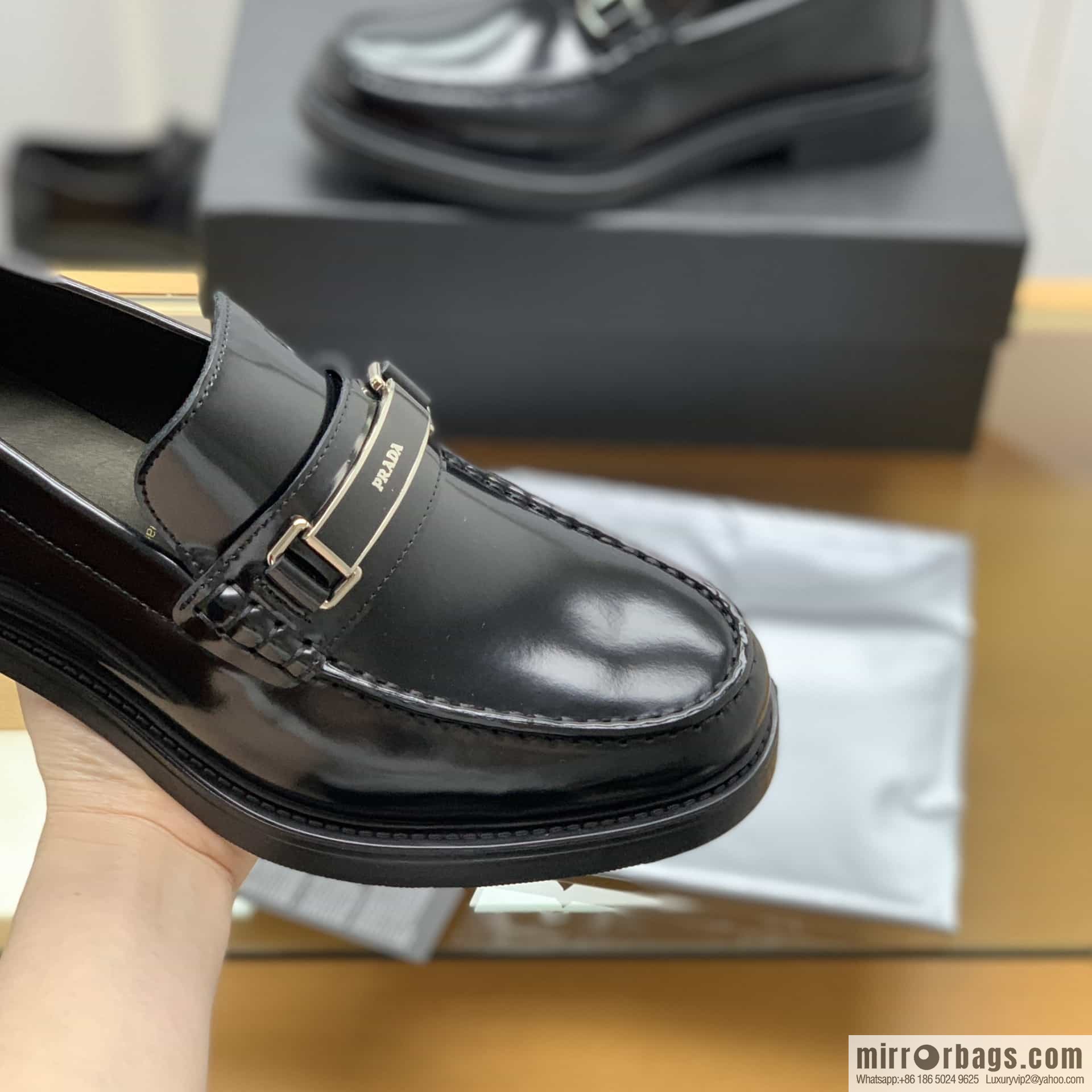 Prada Prada men's loafers crafted in black smooth cow leather (fabric)