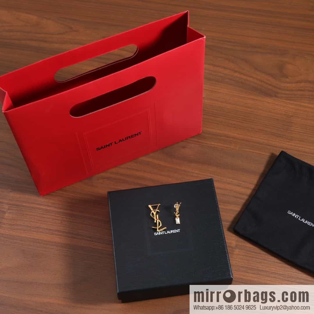 Saint Laurent Asymmetrical YSL stud earrings