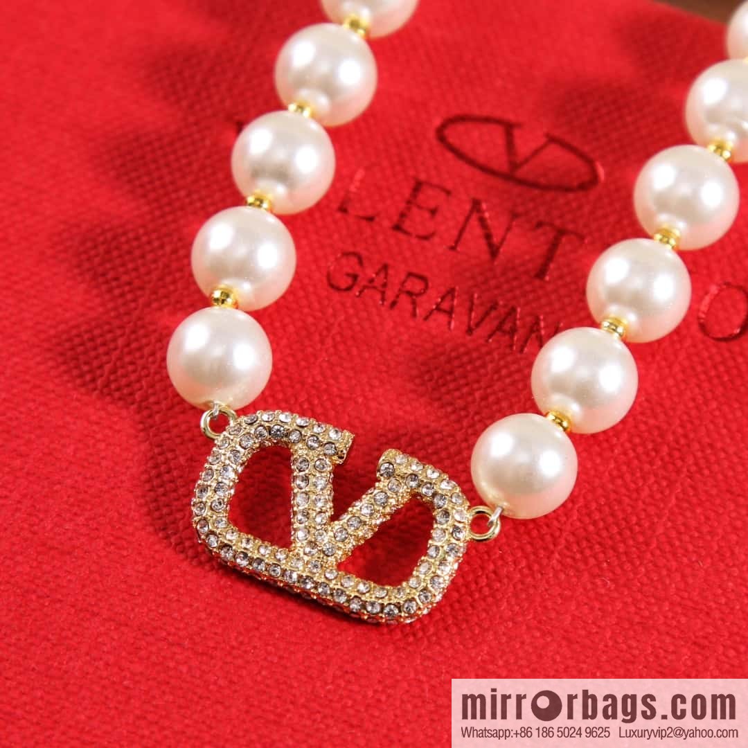 New ☑️ Valentino pearl necklace, stud earrings