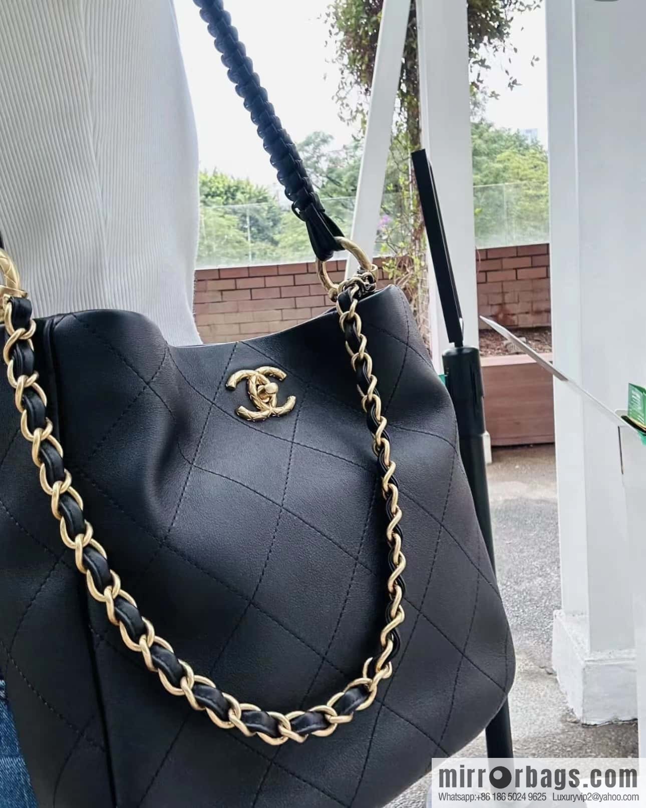 CHANEL 23A Premium Handicraft Collection, Woven Hippie Bag AS4210 black