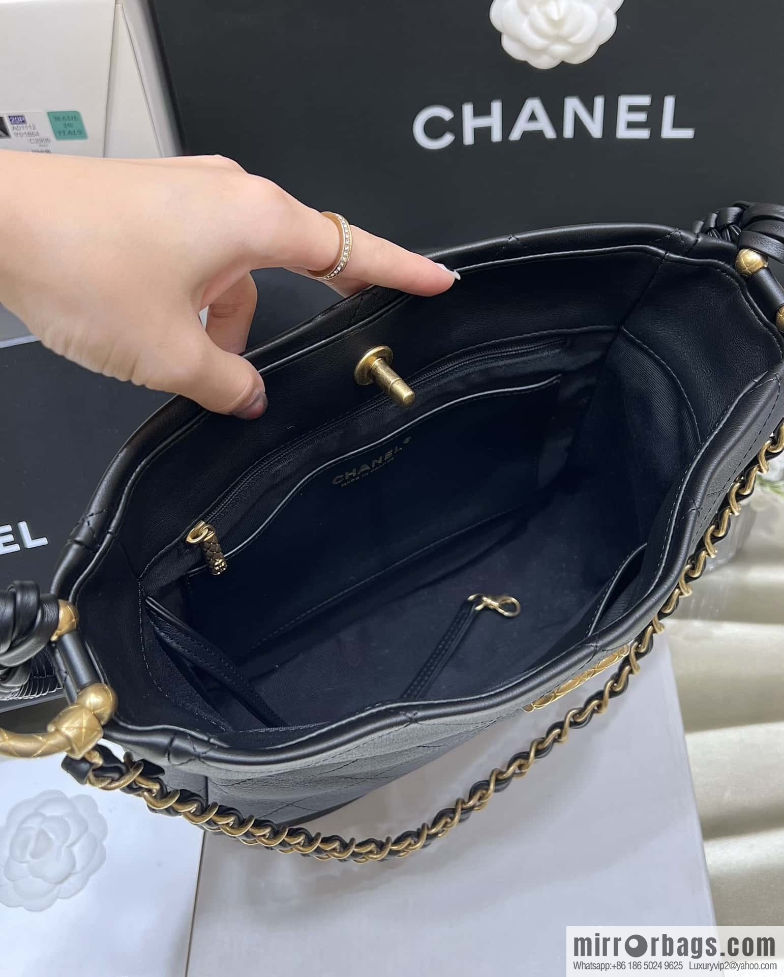 CHANEL 23A Premium Handicraft Collection, Woven Hippie Bag AS4210 black