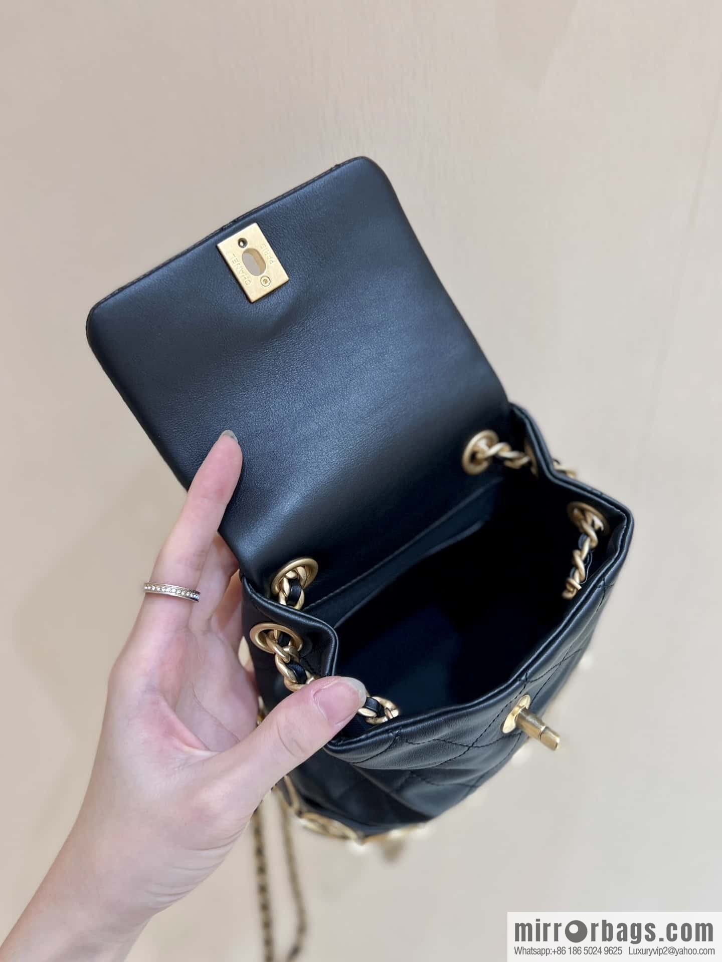 CHANEL 23B autumn and winter trailer series, badge double backpack AS4275