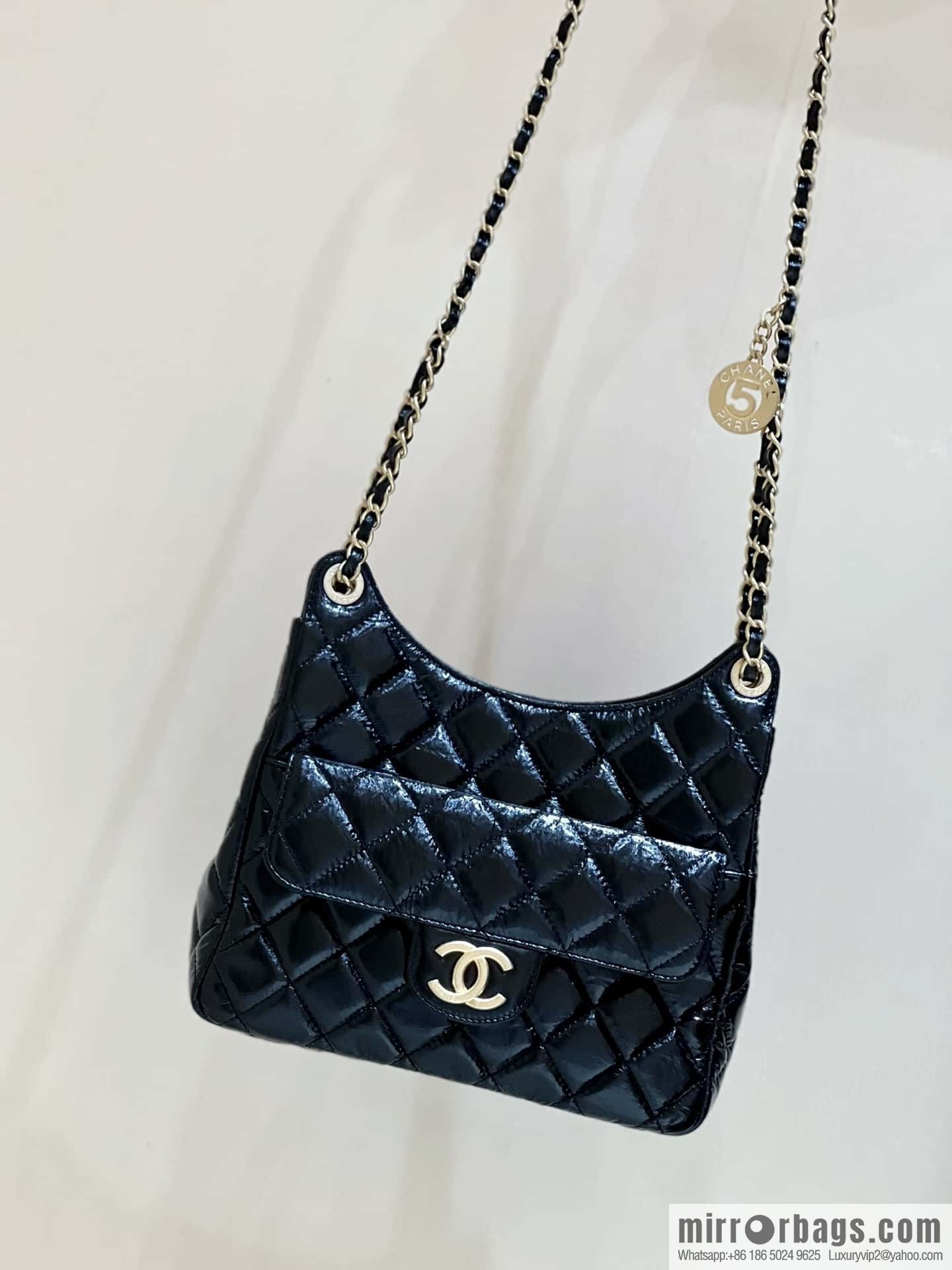 CHANEL 23C early spring vacation new No. 5 gold coin tag hobo hippie bag AS3690