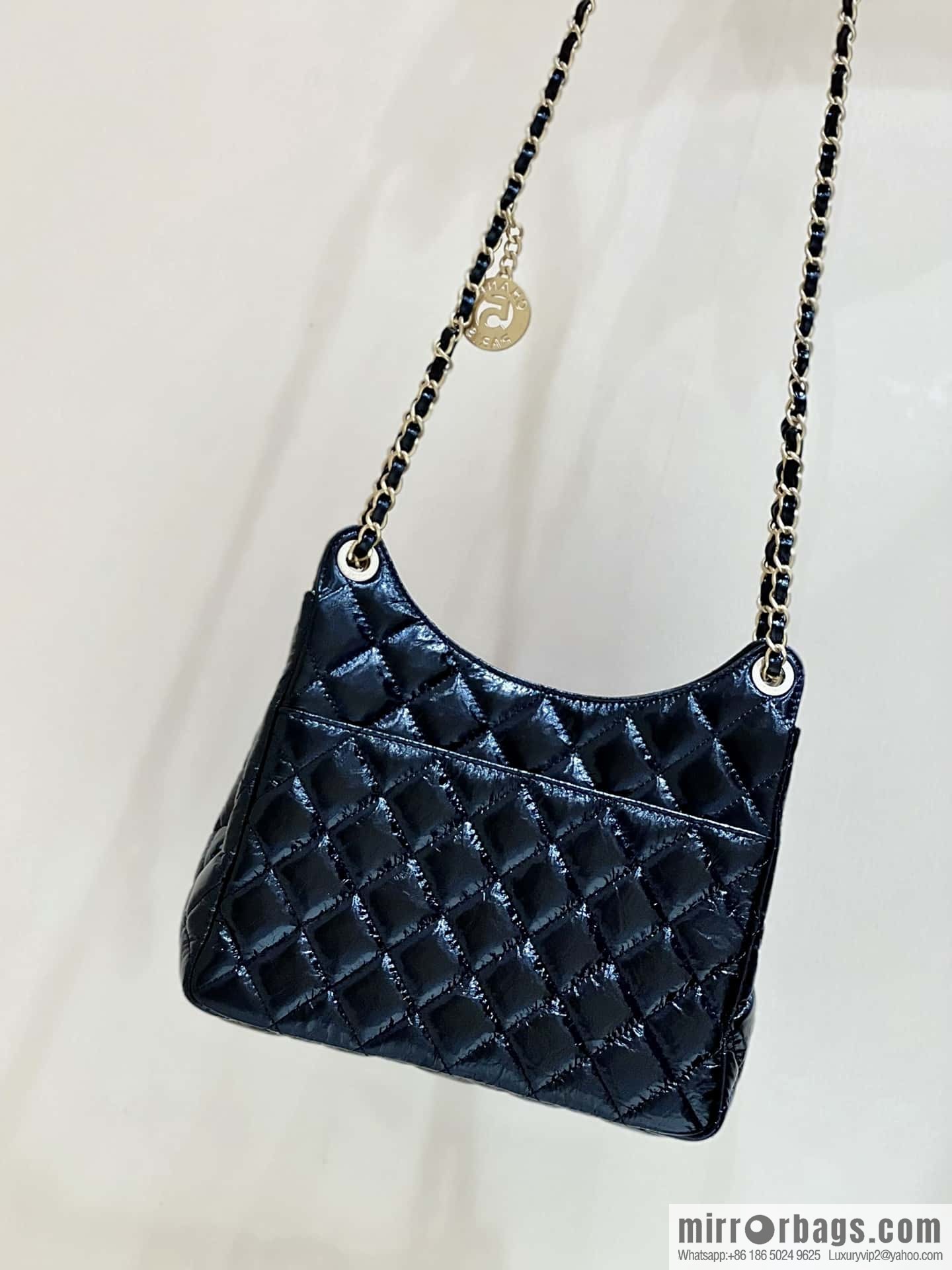 CHANEL 23C early spring vacation new No. 5 gold coin tag hobo hippie bag AS3690
