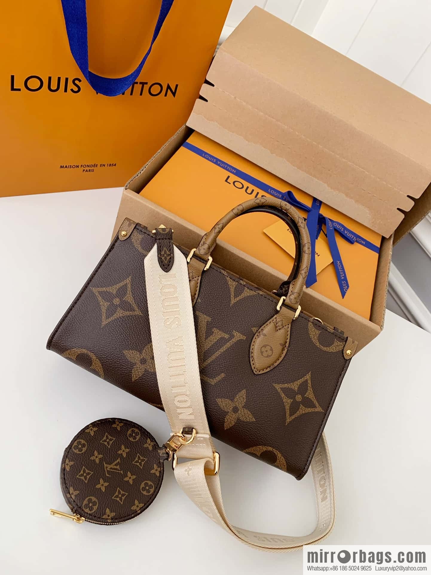 LV M46653 OnTheGo East West