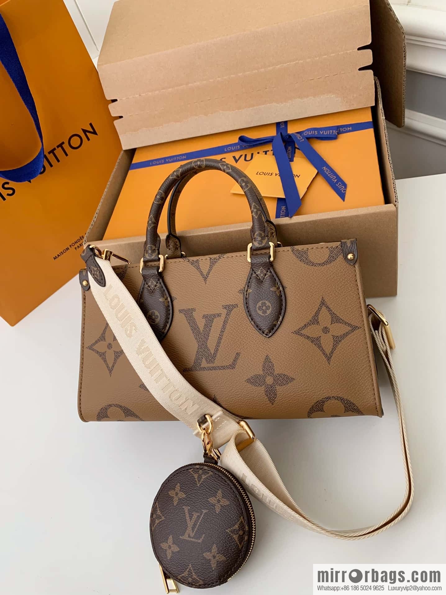 LV M46653 OnTheGo East West