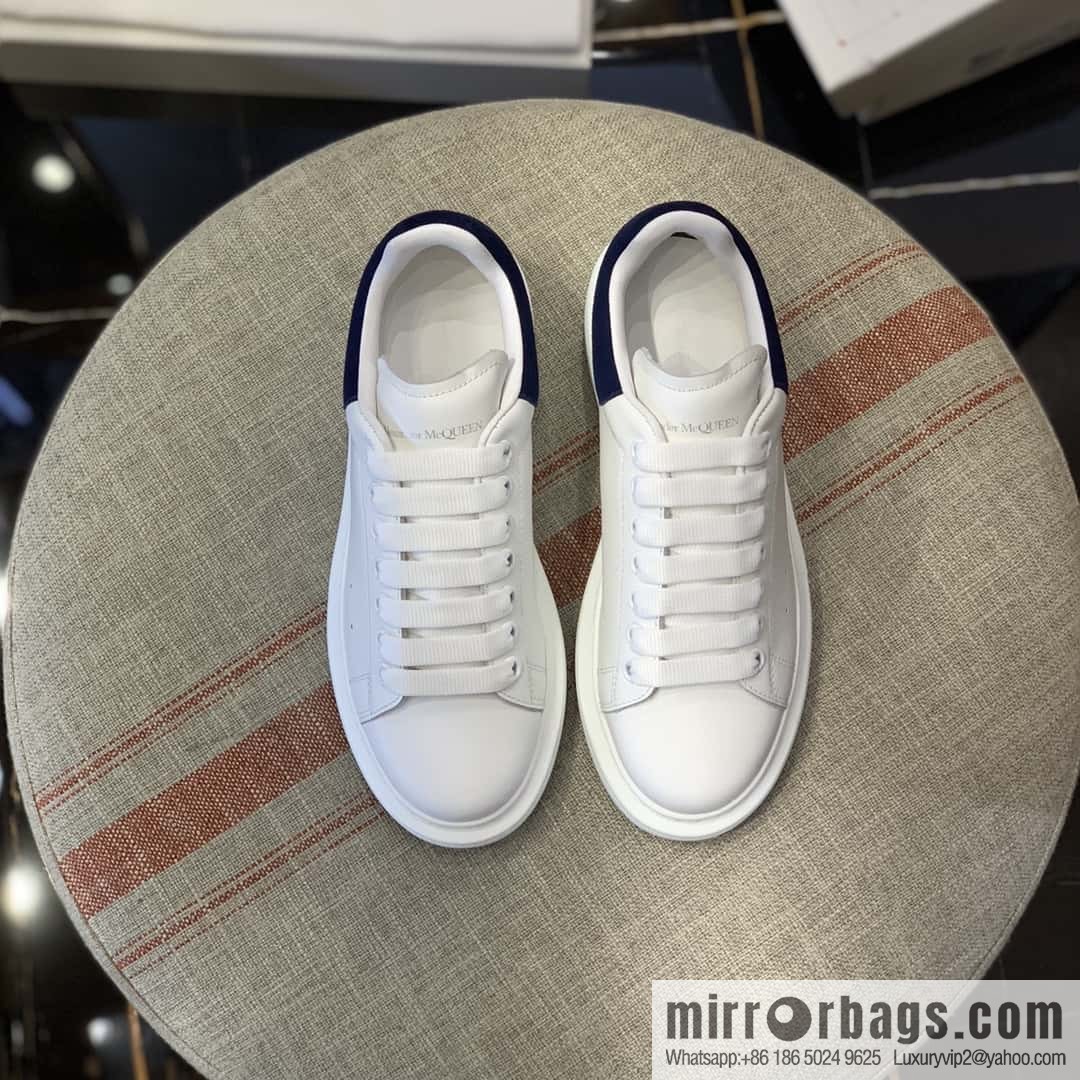 Alexander McQueen dark blue velvet tail sneakers