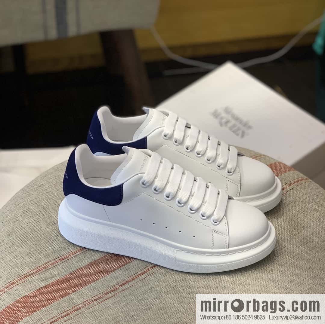 Alexander McQueen dark blue velvet tail sneakers