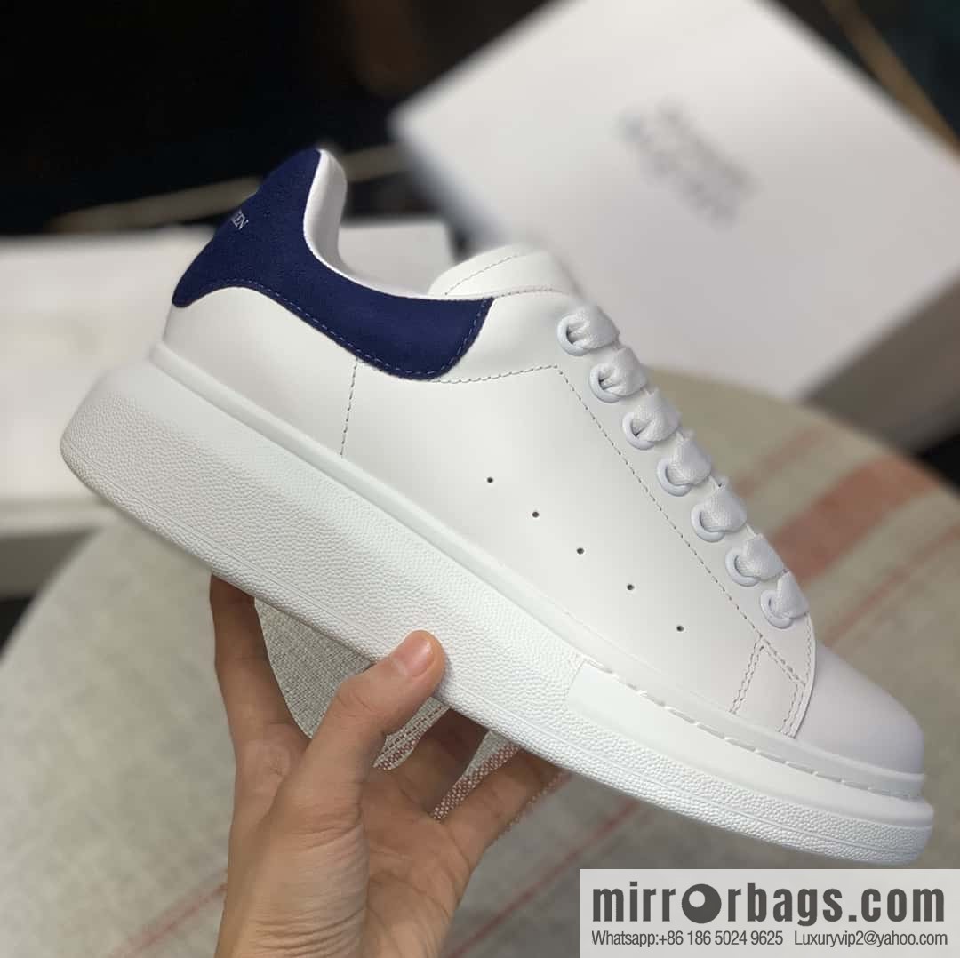 Alexander McQueen dark blue velvet tail sneakers
