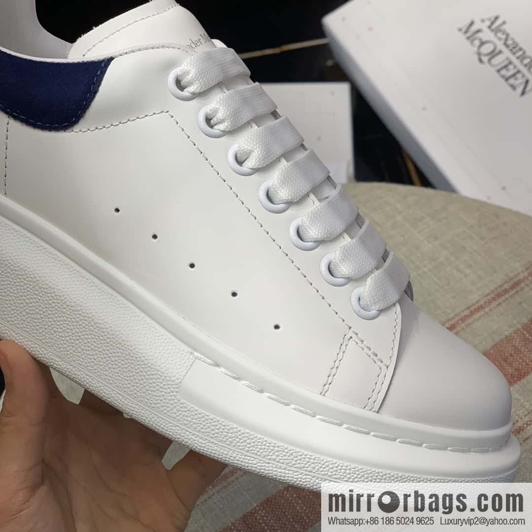 Alexander McQueen dark blue velvet tail sneakers