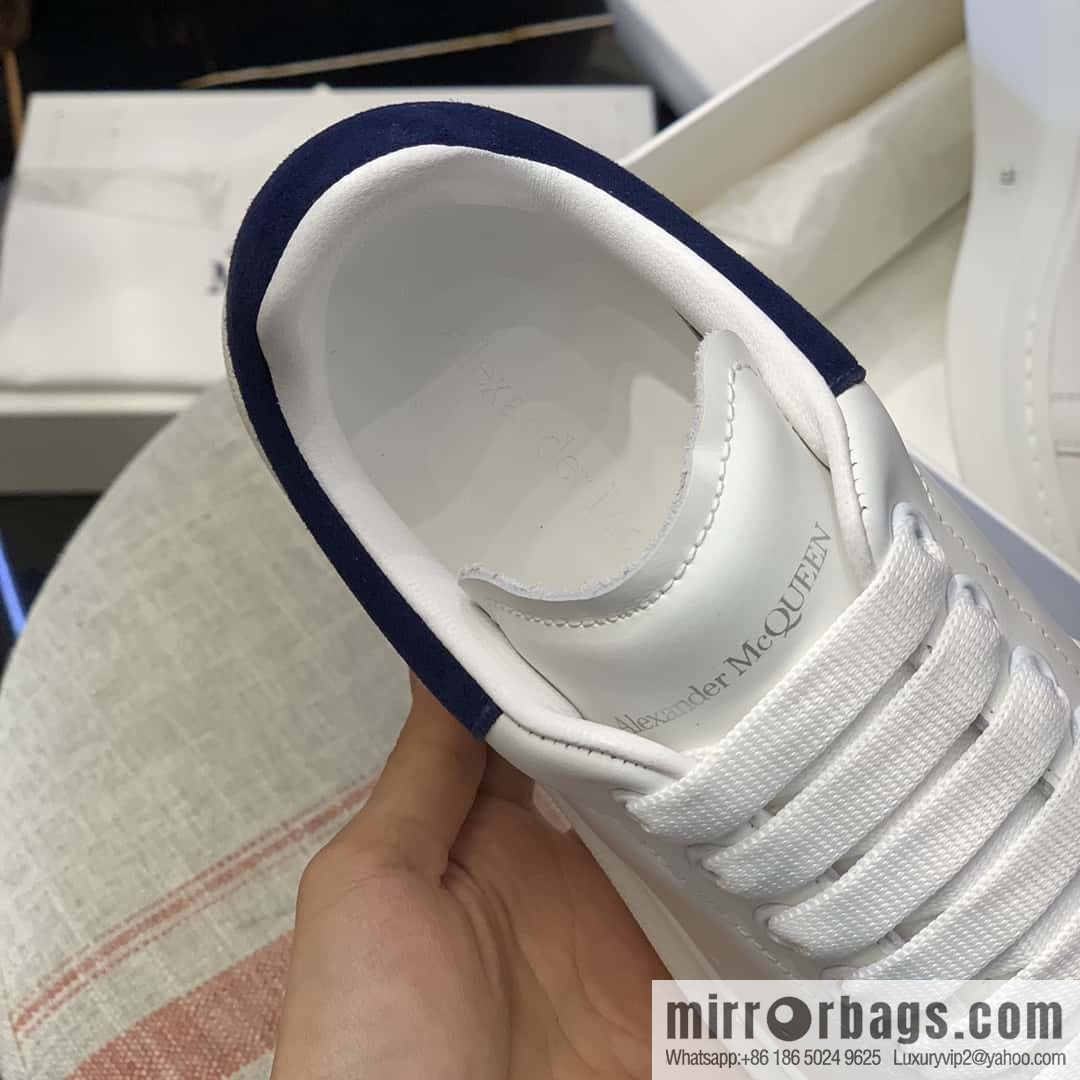 Alexander McQueen dark blue velvet tail sneakers
