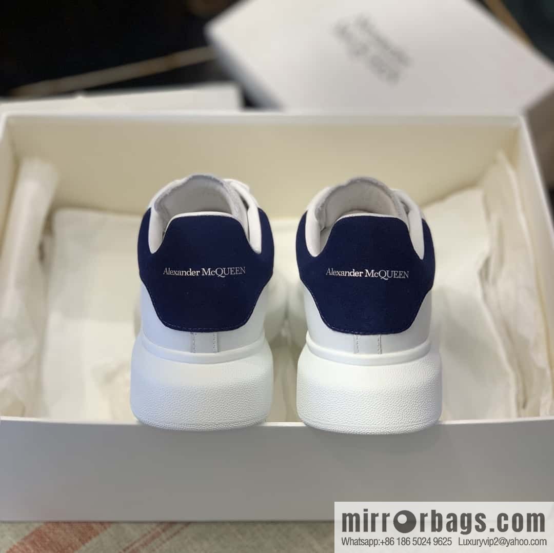 Alexander McQueen dark blue velvet tail sneakers