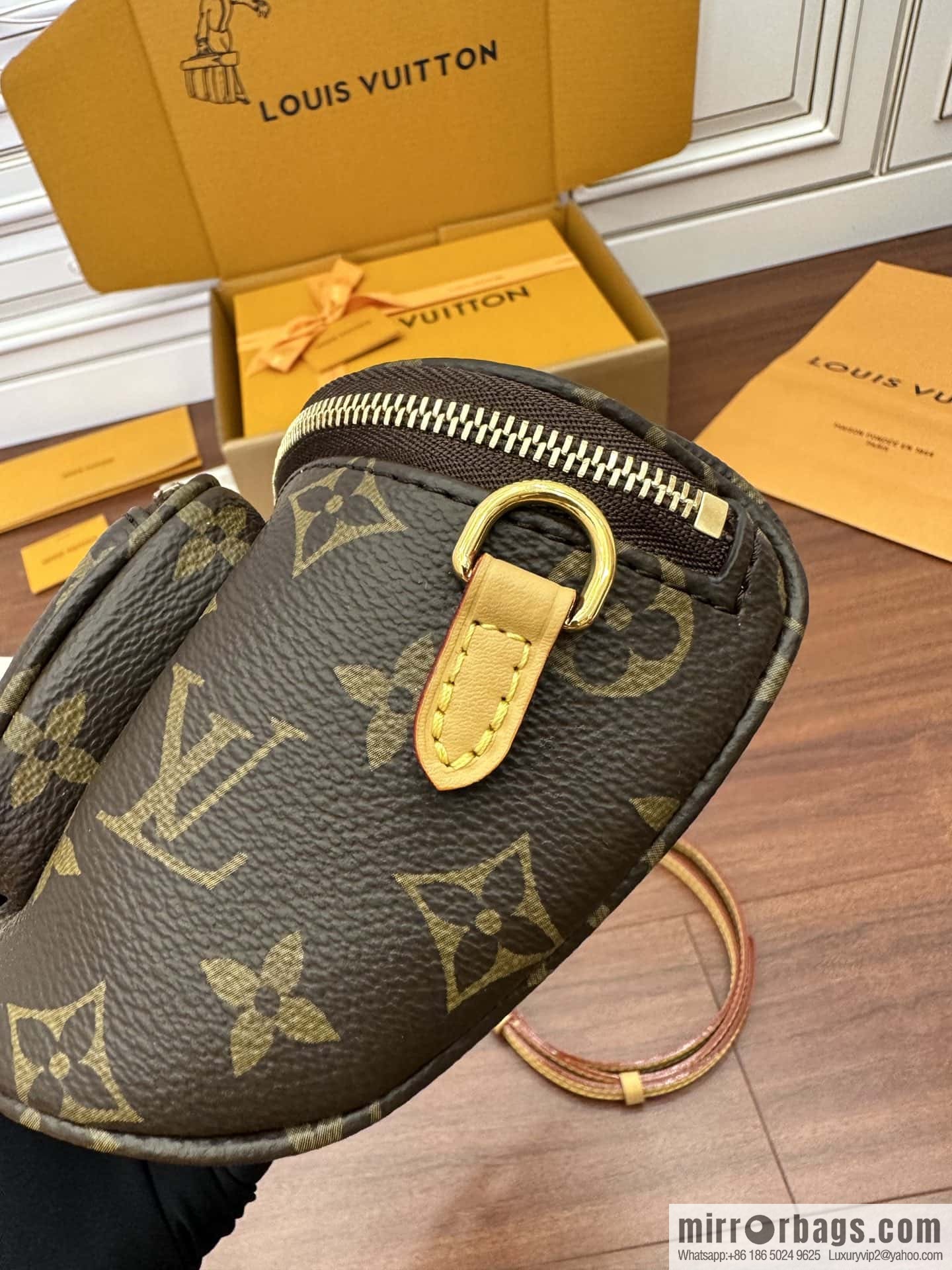 LV MINI BUMBAG handbag M82335