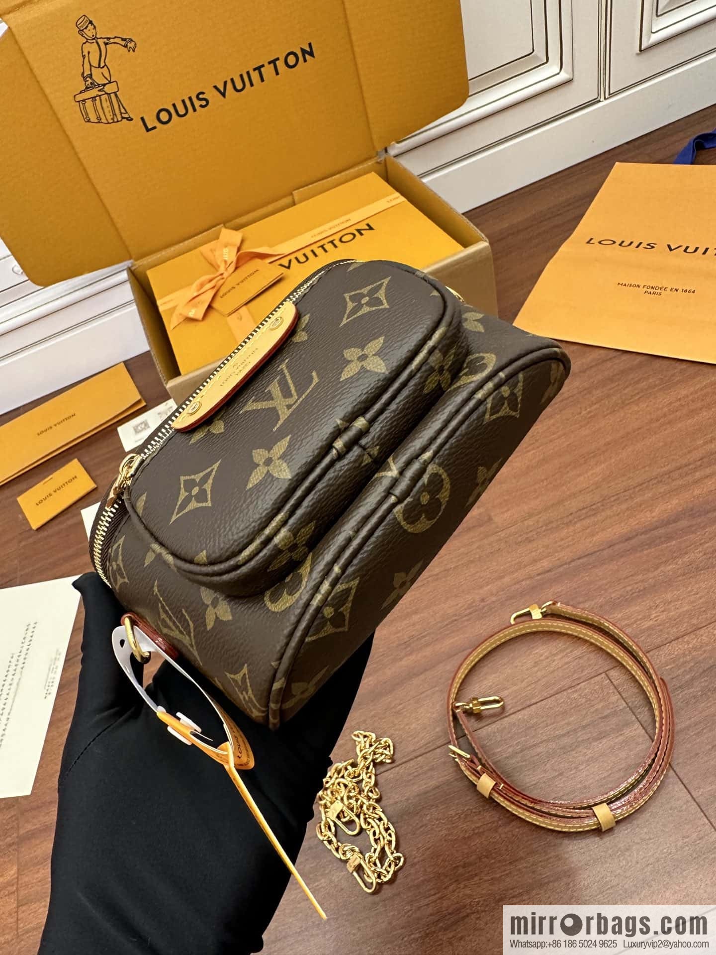 LV MINI BUMBAG handbag M82335