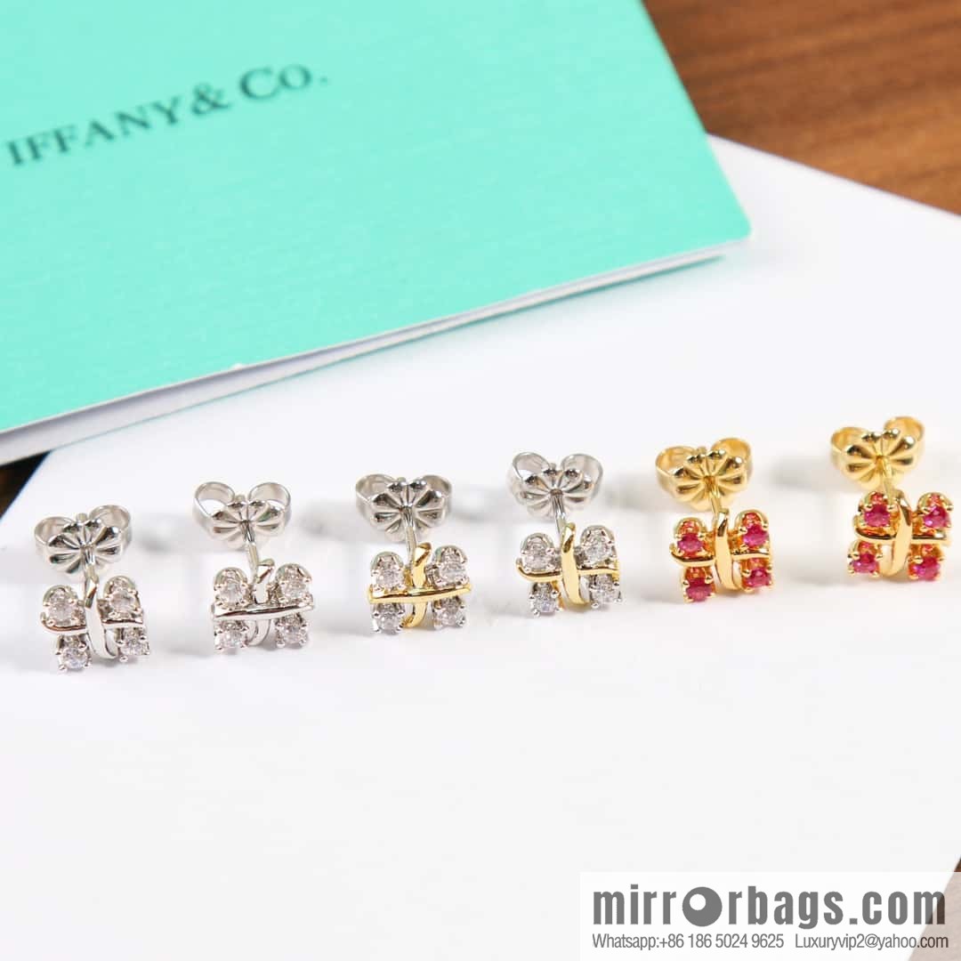 New ☑️ Tiffany & Co. Tiffany color cross stud earrings