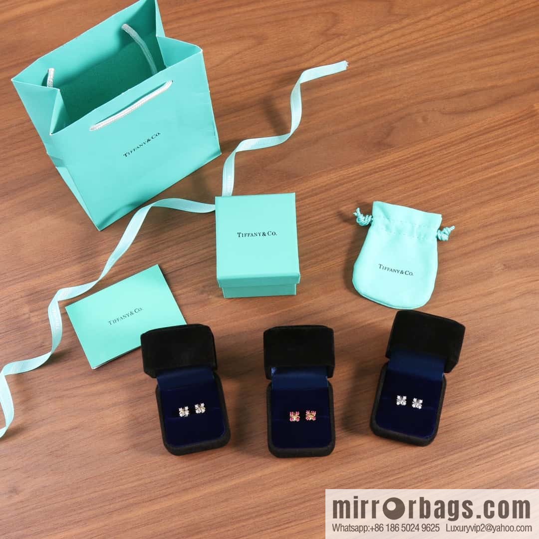 New ☑️ Tiffany & Co. Tiffany color cross stud earrings