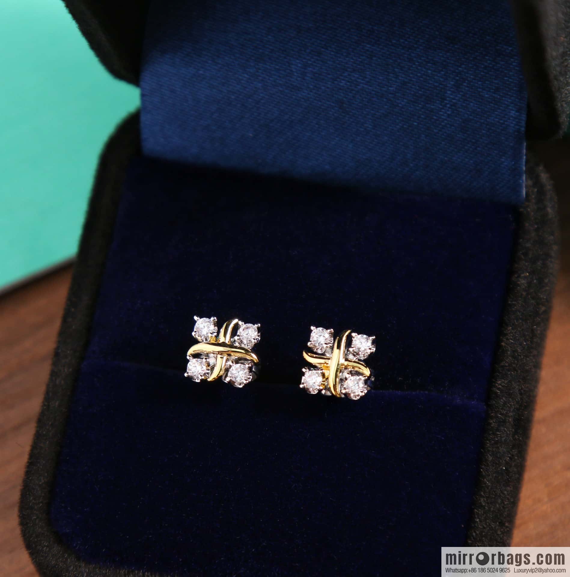 New ☑️ Tiffany & Co. Tiffany color cross stud earrings