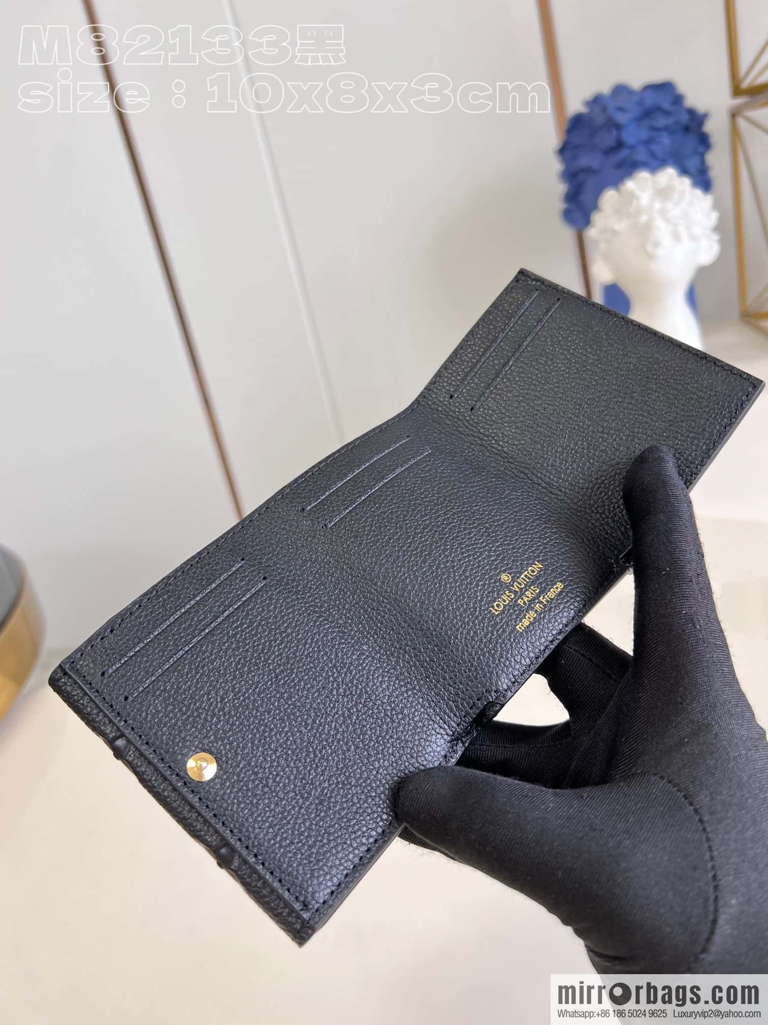 LV M82133 CELESTE Wallet