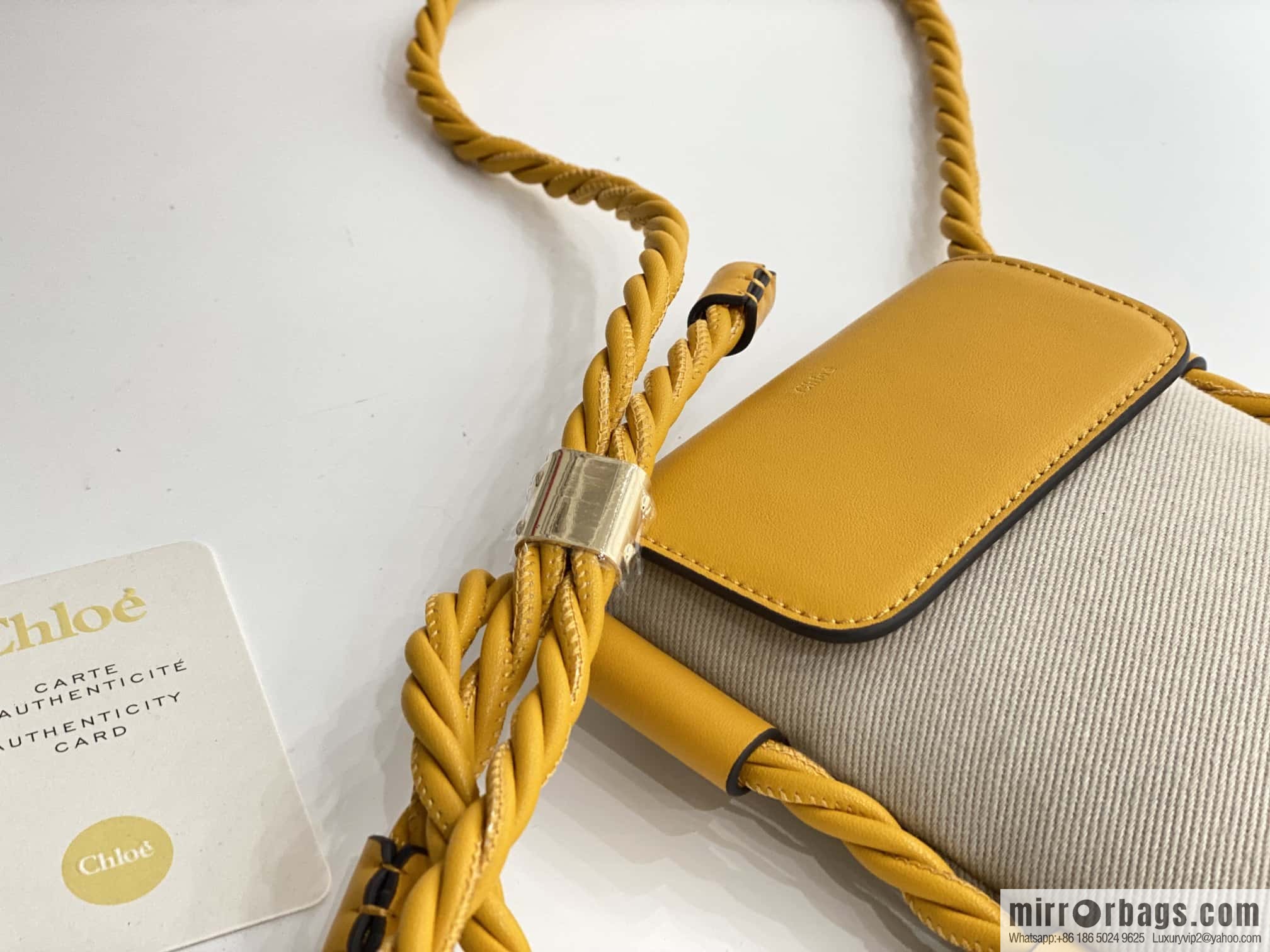 Chloe key X mobile phone bag, yellow cloth.