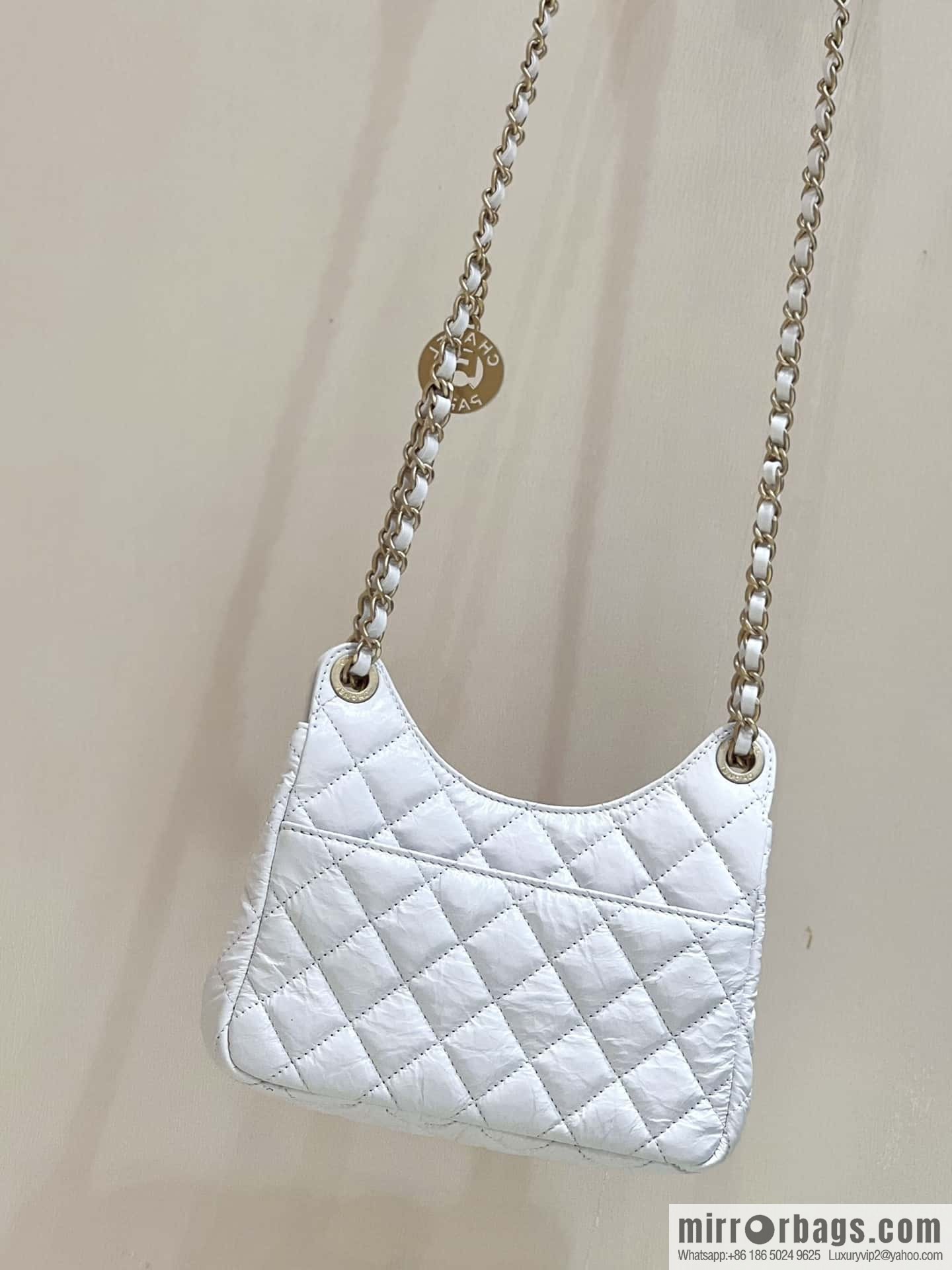 CHANEL 23C early spring vacation new No. 5 gold coin tag hobo hippie bag AS3710 white