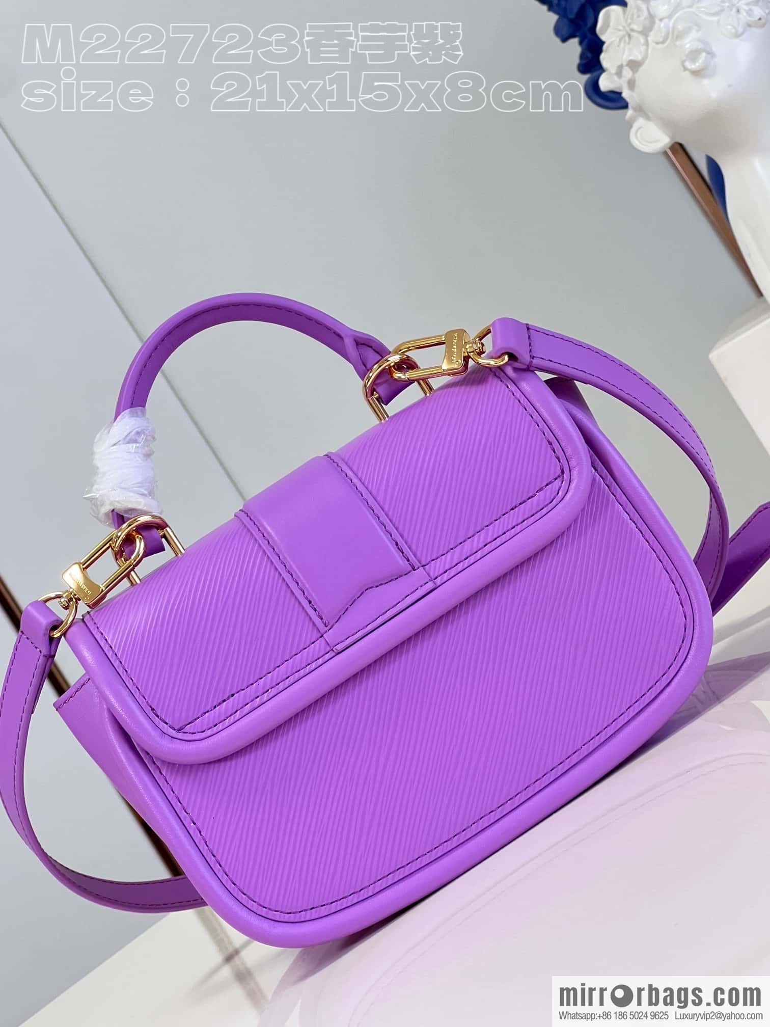 LV M22721 HIDE AND SEEK BAG