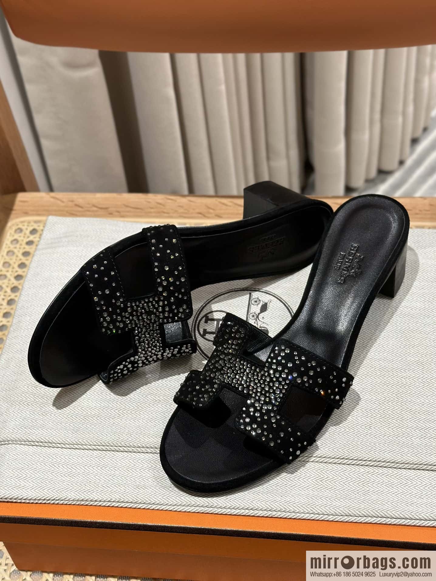 Hermès' latest diamond-faced H slippers