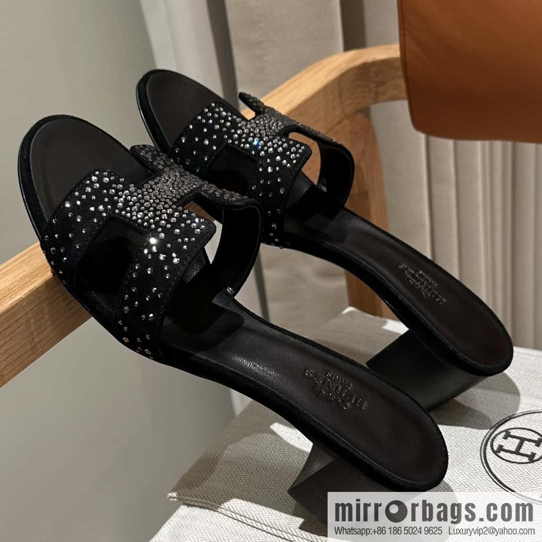 Hermès' latest diamond-faced H slippers
