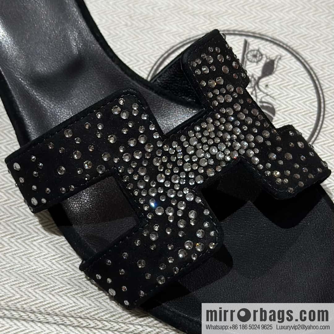 Hermès' latest diamond-faced H slippers