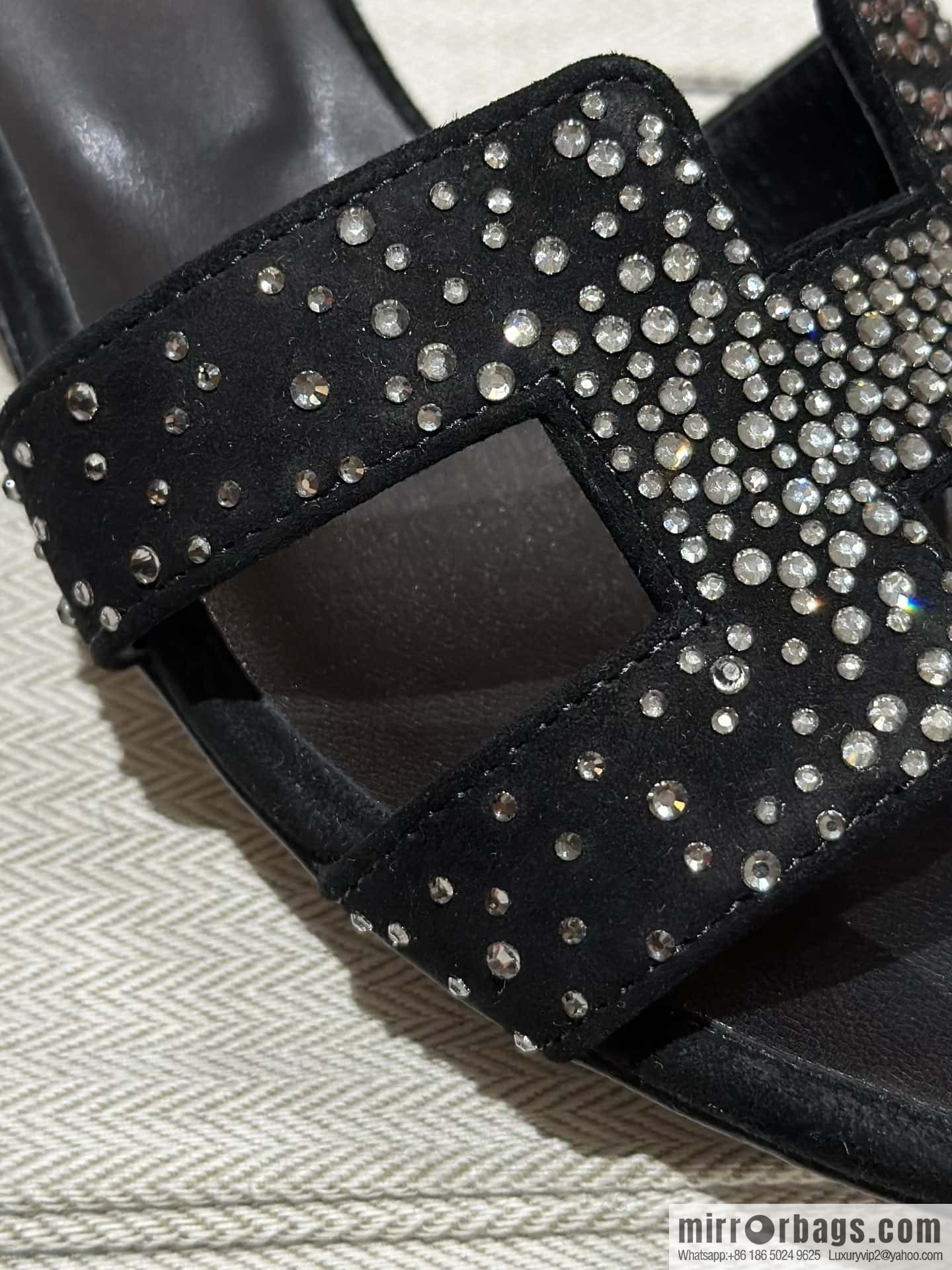 Hermès' latest diamond-faced H slippers