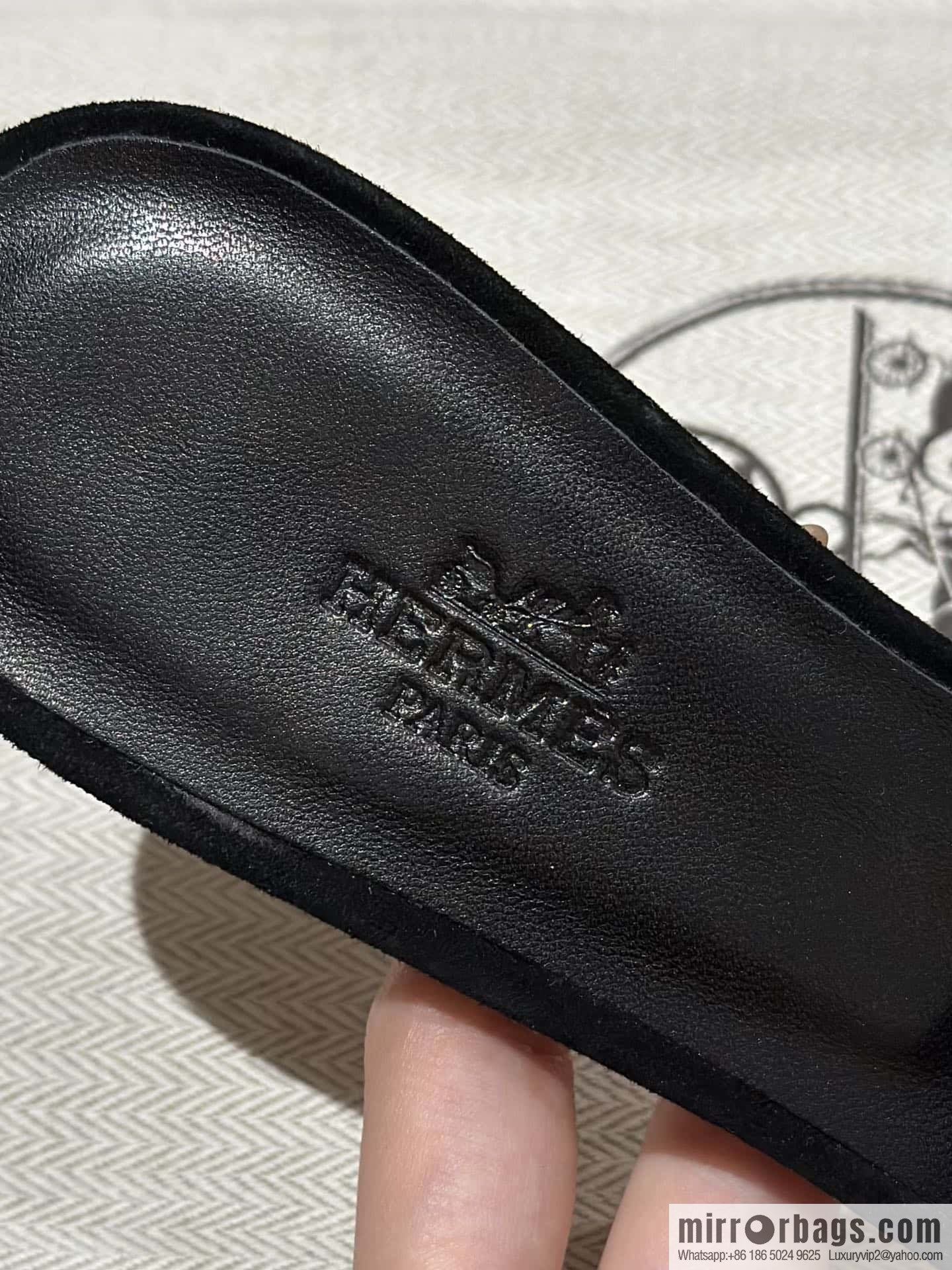 Hermès' latest diamond-faced H slippers