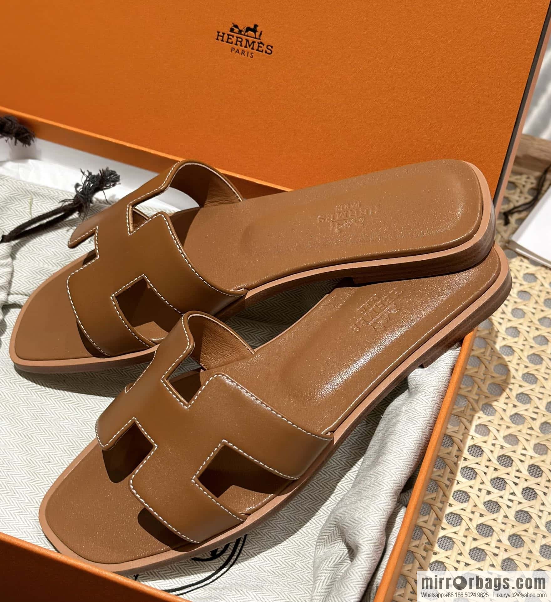 Hermès leather outsole H slippers, brown