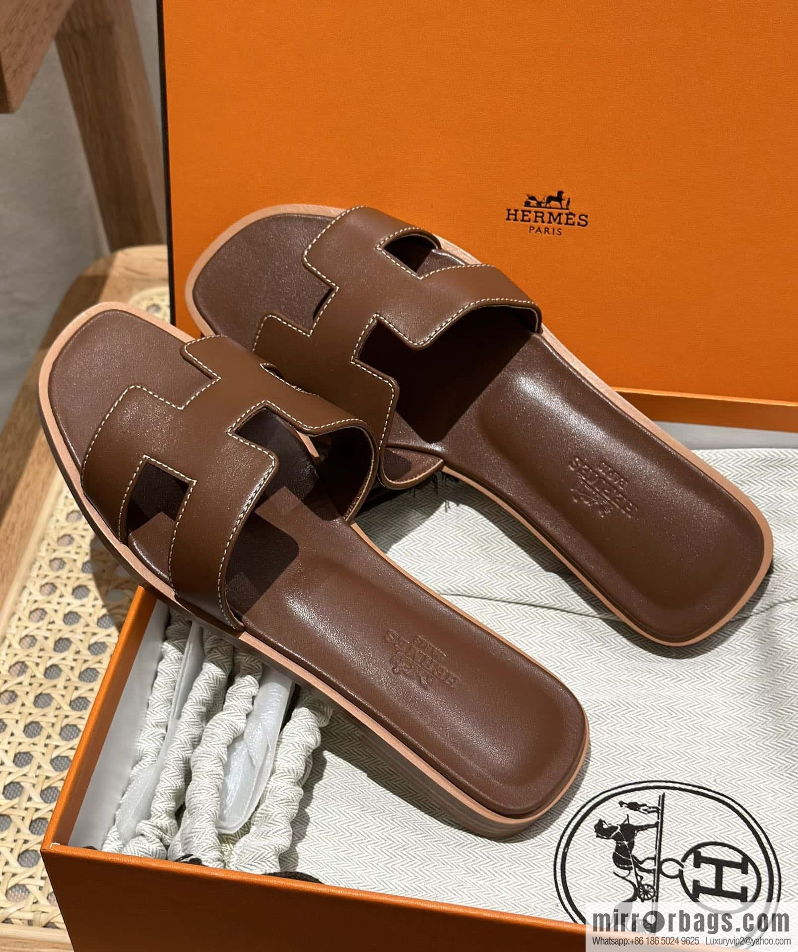 Hermès leather outsole H slippers, dark brown