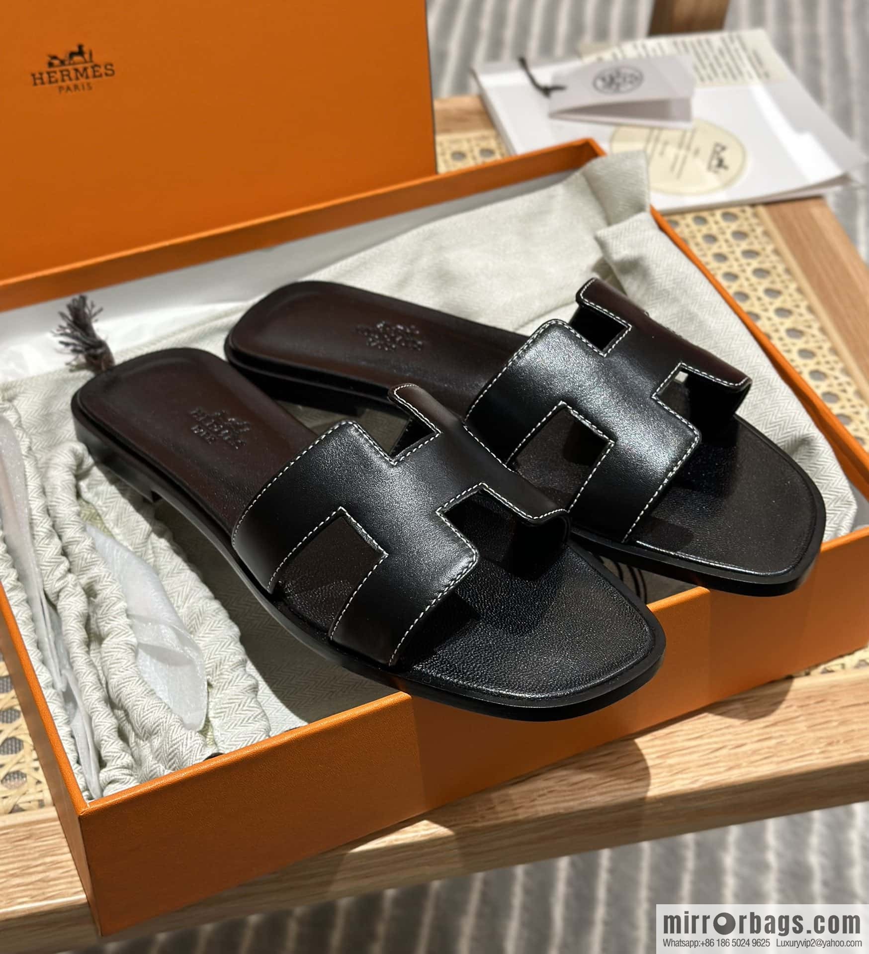Hermès leather outsole H slippers, black