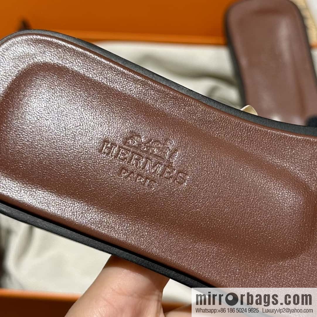Hermès leather outsole H slippers, dark brown and black.