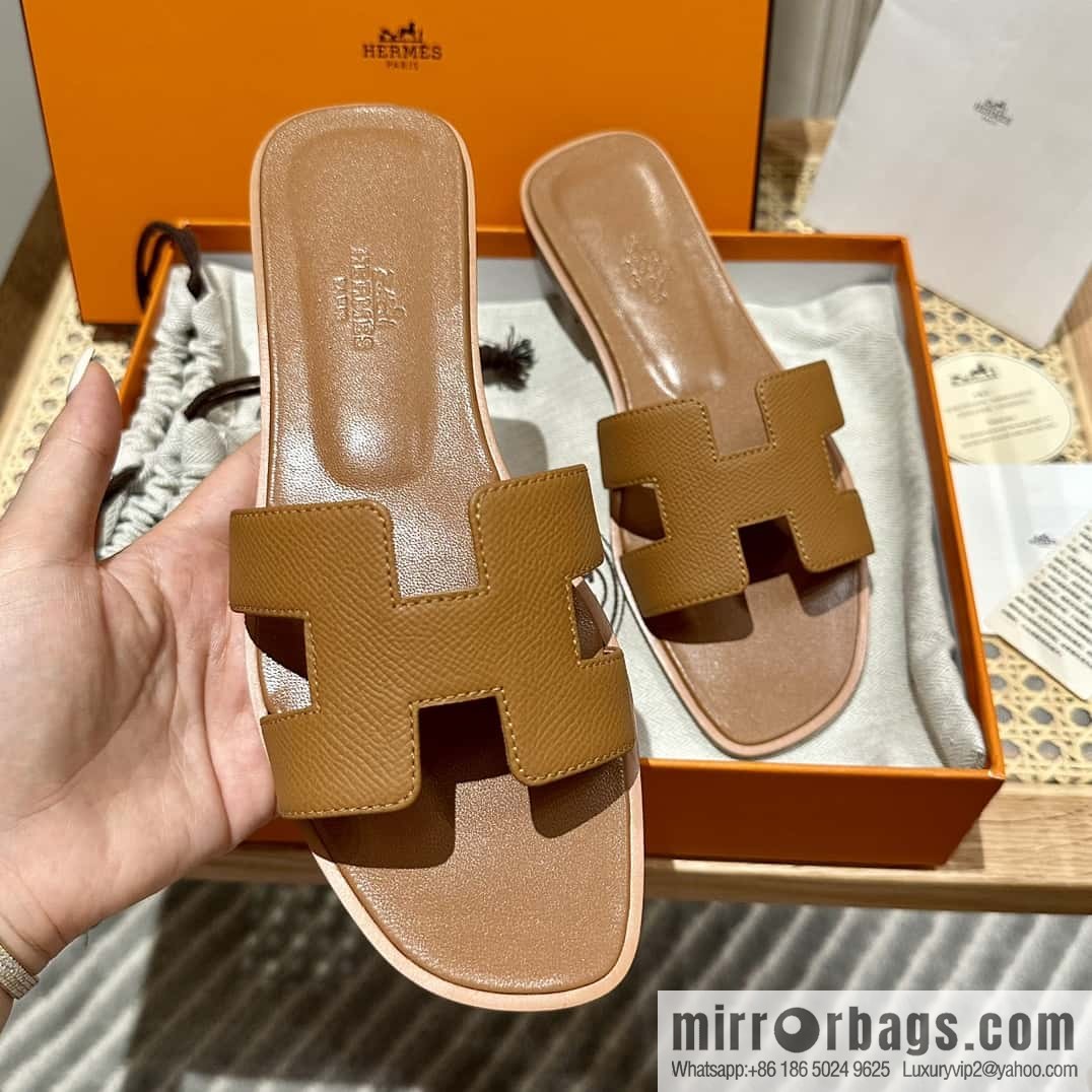 Hermès leather outsole H slippers, brown
