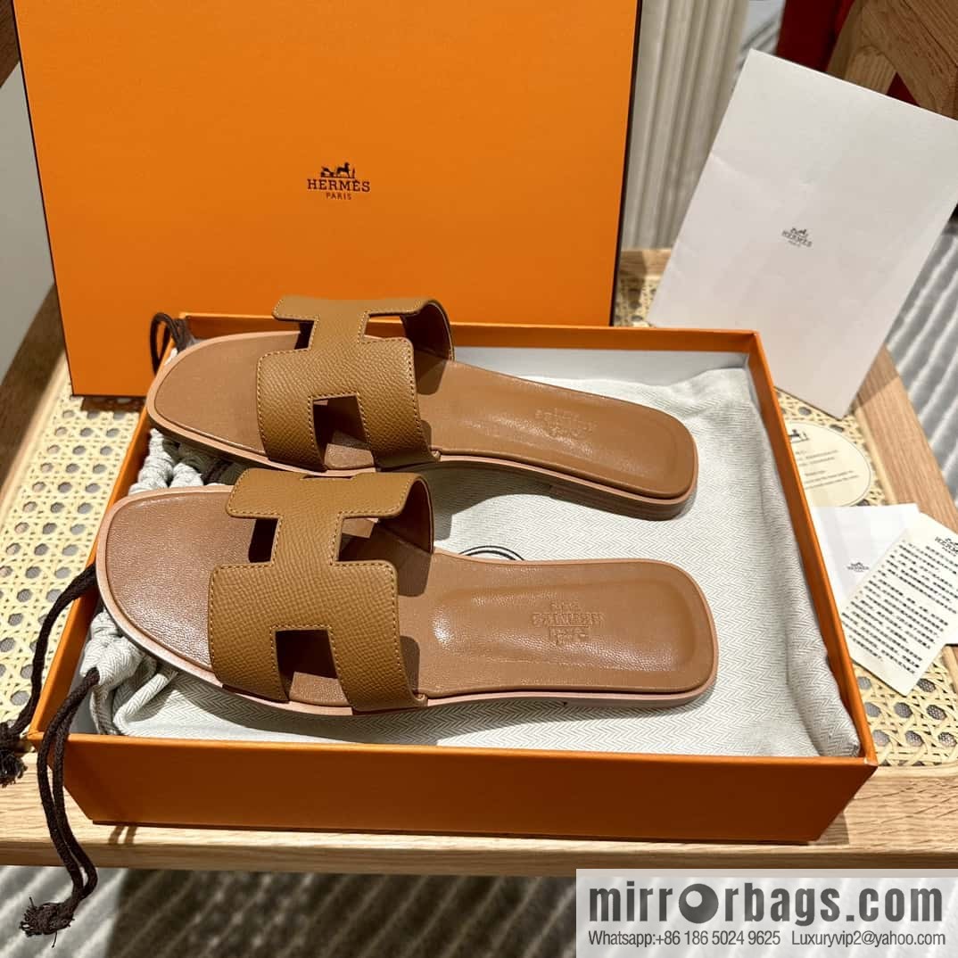 Hermès leather outsole H slippers, brown