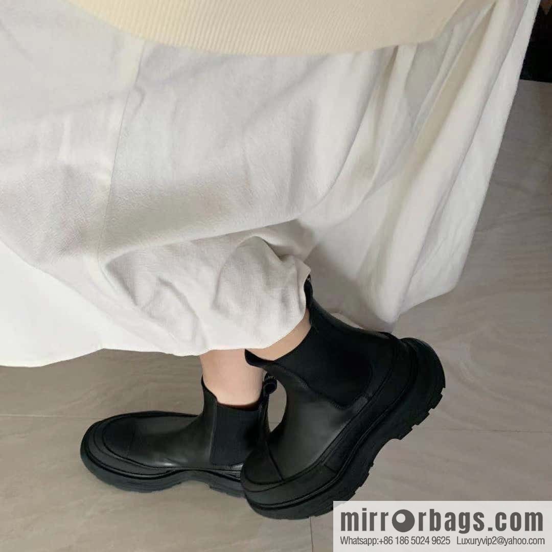 Alexander McQueen, platform black calfskin Chelsea booties