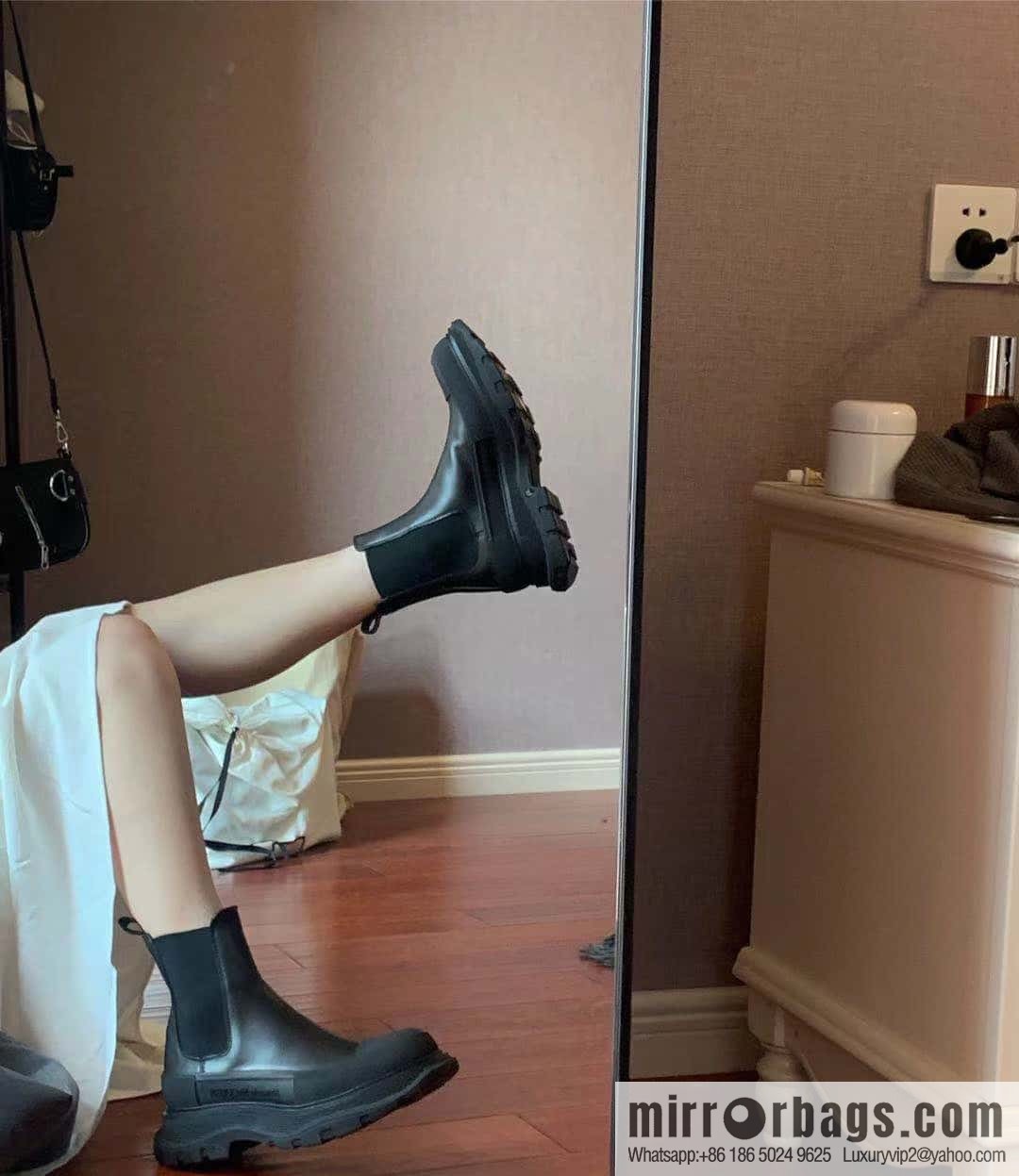Alexander McQueen, platform black calfskin Chelsea booties