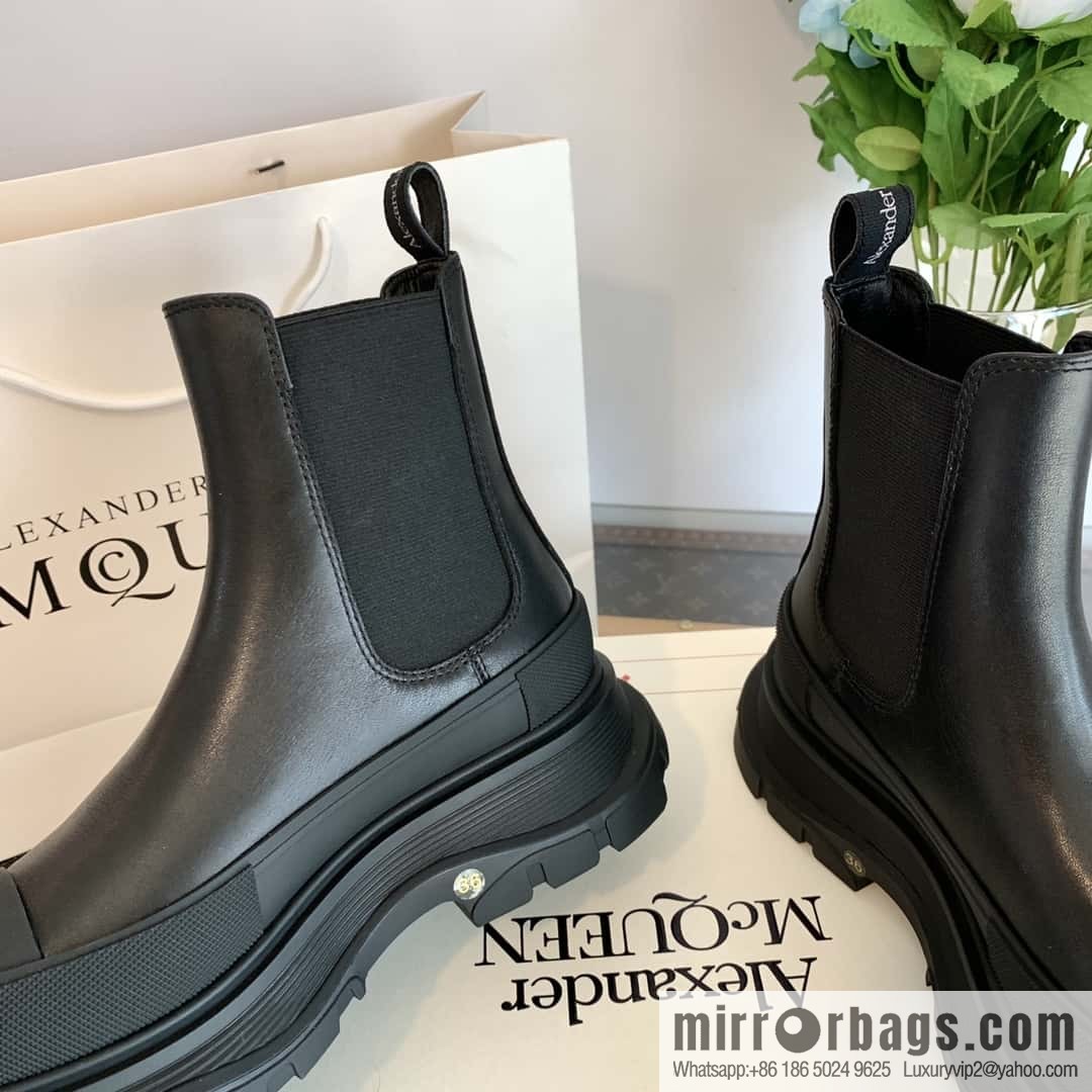 Alexander McQueen, platform black calfskin Chelsea booties