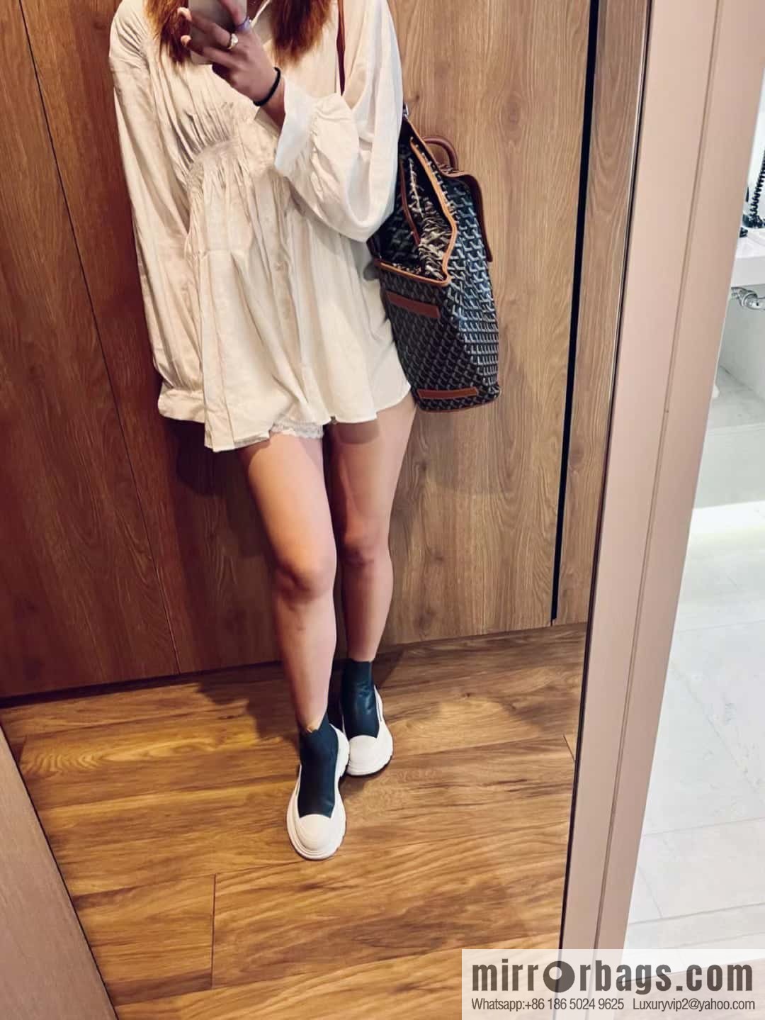 Alexander McQueen, platform black and white Chelsea booties