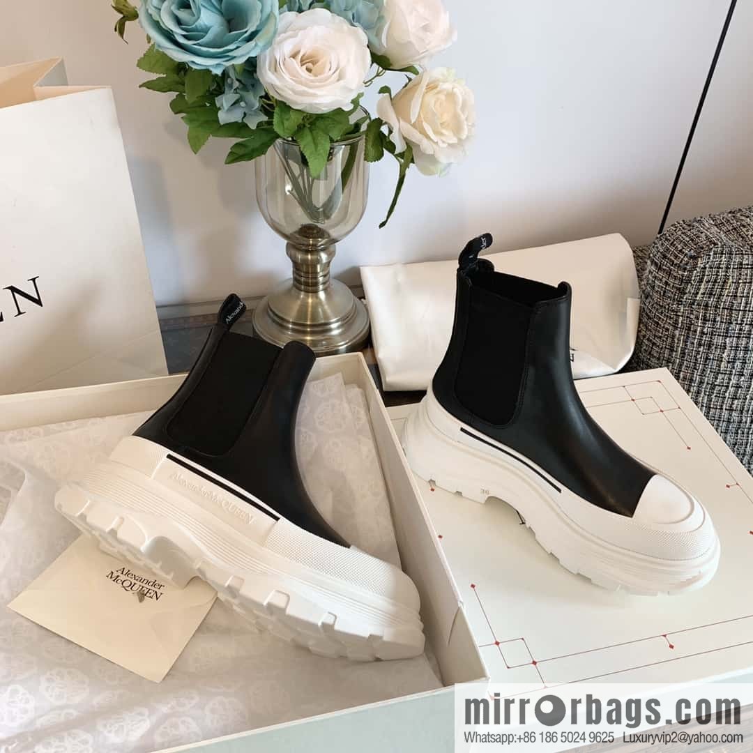Alexander McQueen, platform black and white Chelsea booties