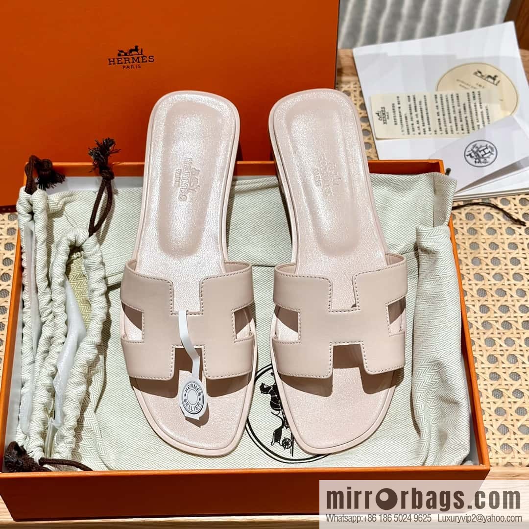 Hermès leather outsole H slippers, pink.