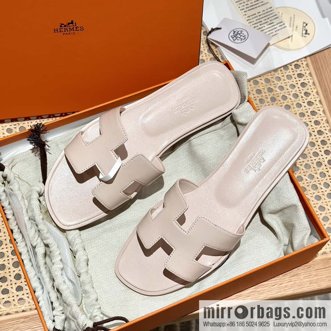 Hermès leather outsole H slippers, pink.