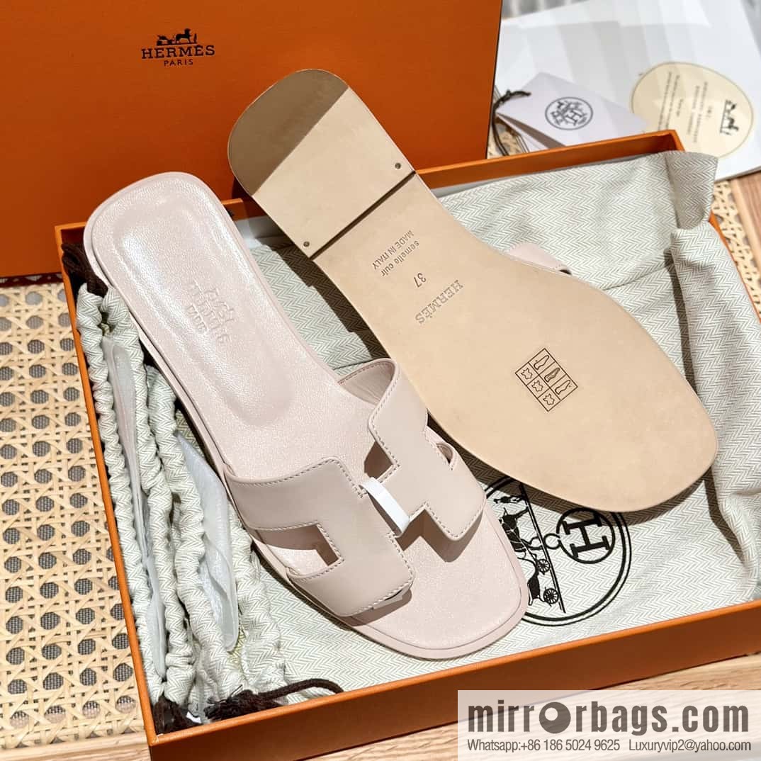 Hermès leather outsole H slippers, pink.