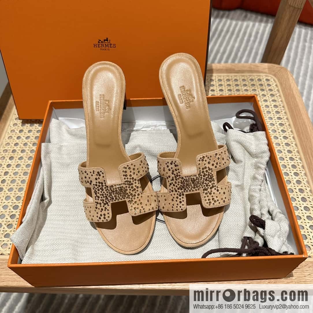 Hermes, the classic new diamond-faced H slippers.