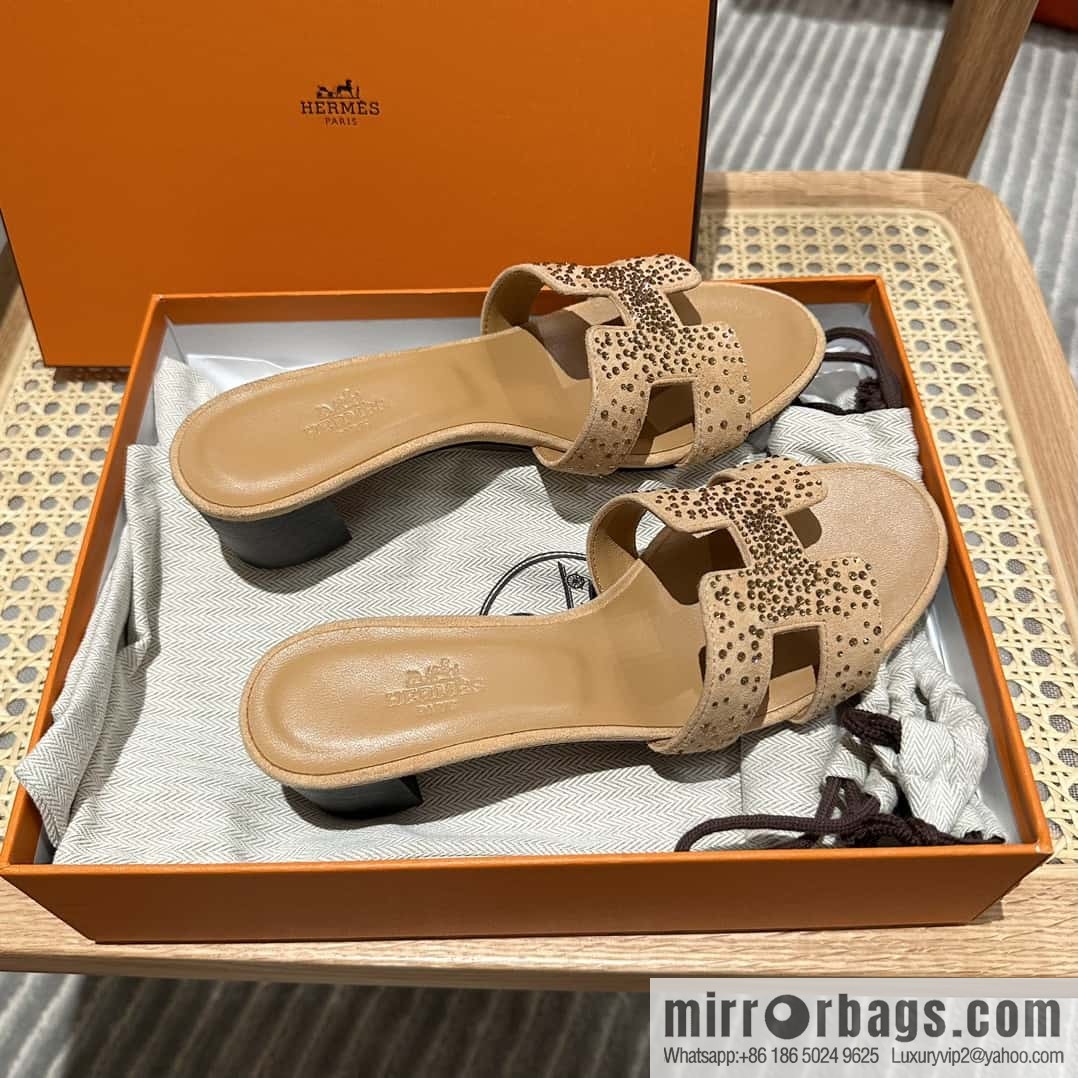 Hermes, the classic new diamond-faced H slippers.